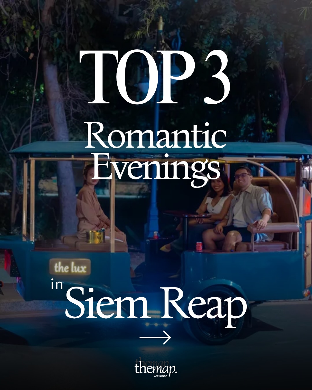 Couple riding an illuminated blue tuk-tuk at night in Siem Reap