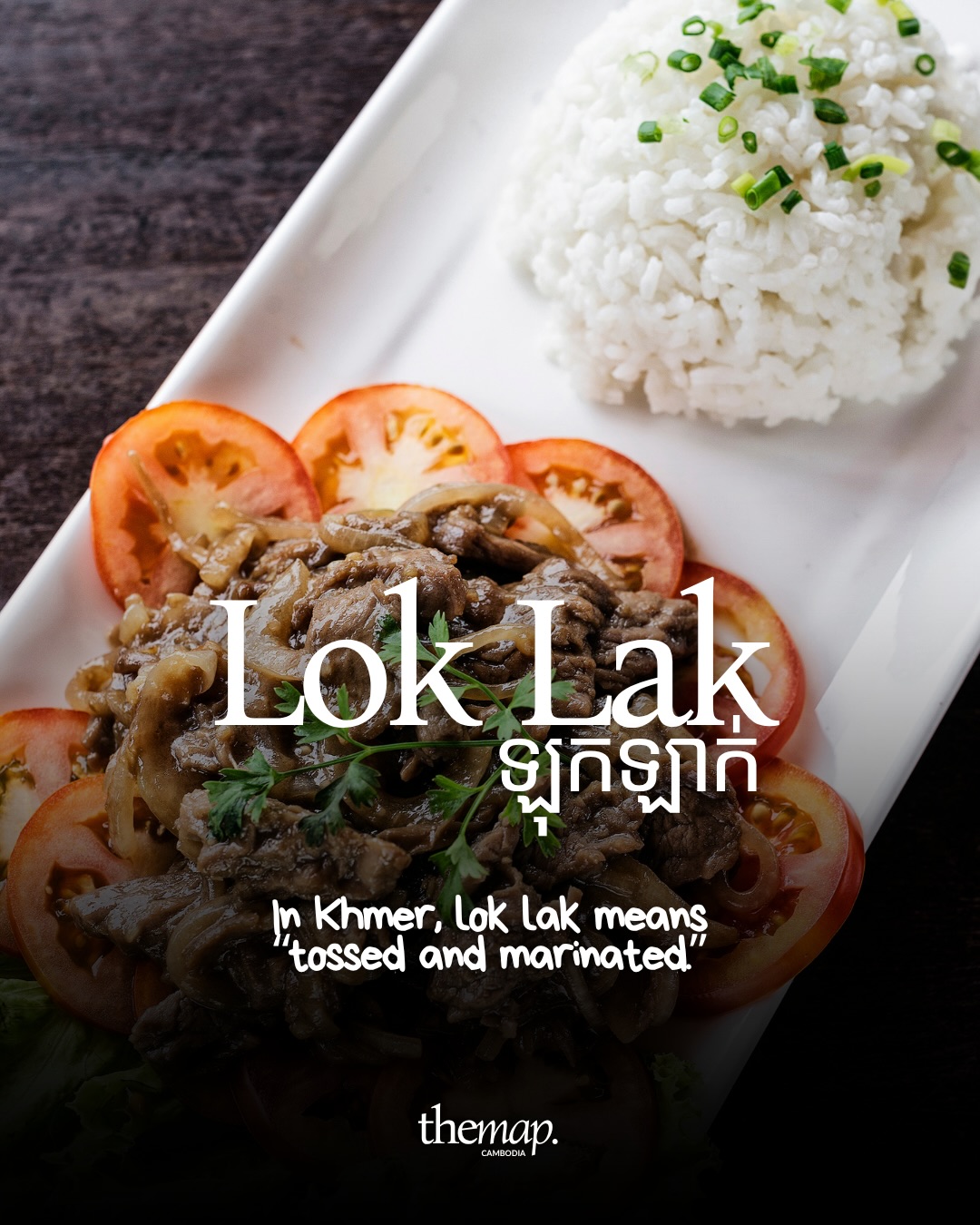Lok lak marinated beef with tomato slices and a mound of white rice