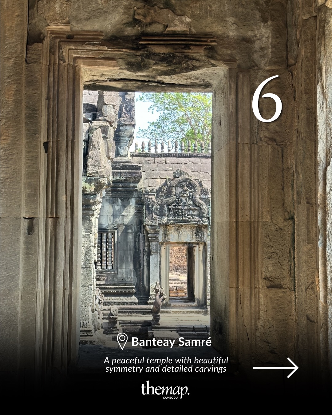 View through a stone doorway into the carved galleries of Banteay Samré