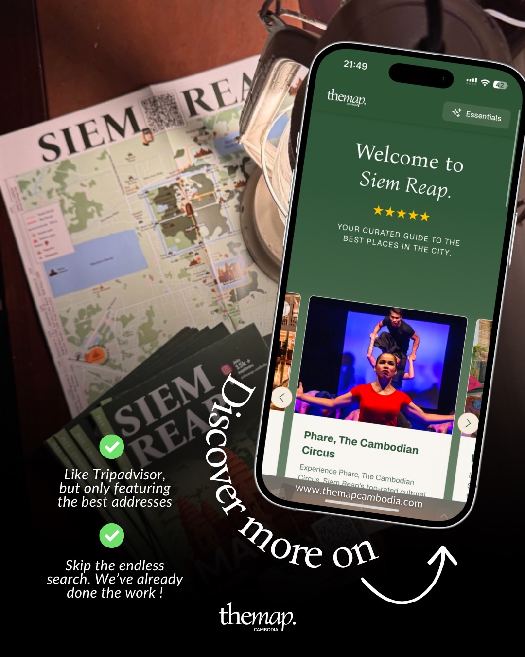 The Map Cambodia digital guide to Siem Reap open on a phone beside the printed map
