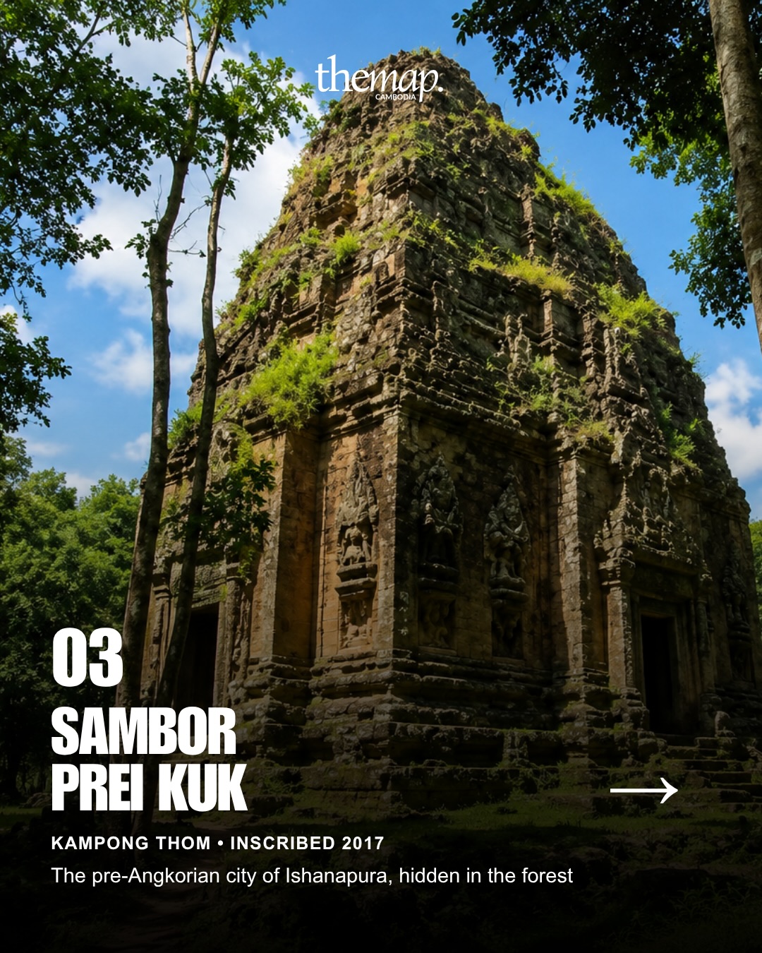 A brick tower of Sambor Prei Kuk with carved niches and vegetation on its upper courses