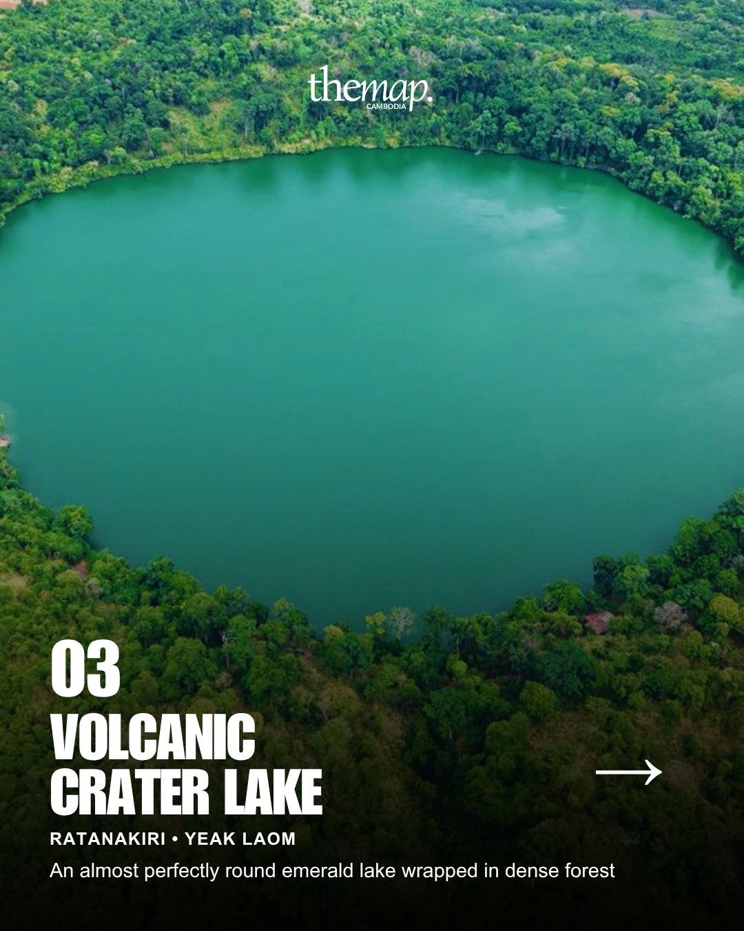 The round emerald crater lake of Yeak Laom surrounded by dense forest
