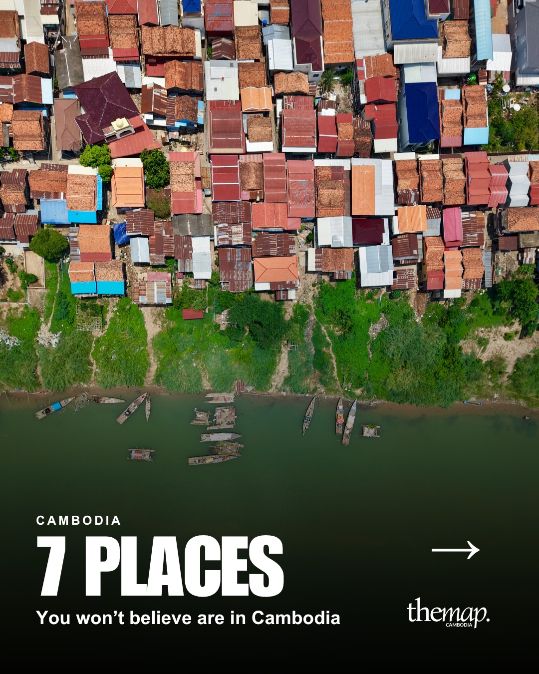Riverside houses and wooden boats along the Mekong, seen from directly above